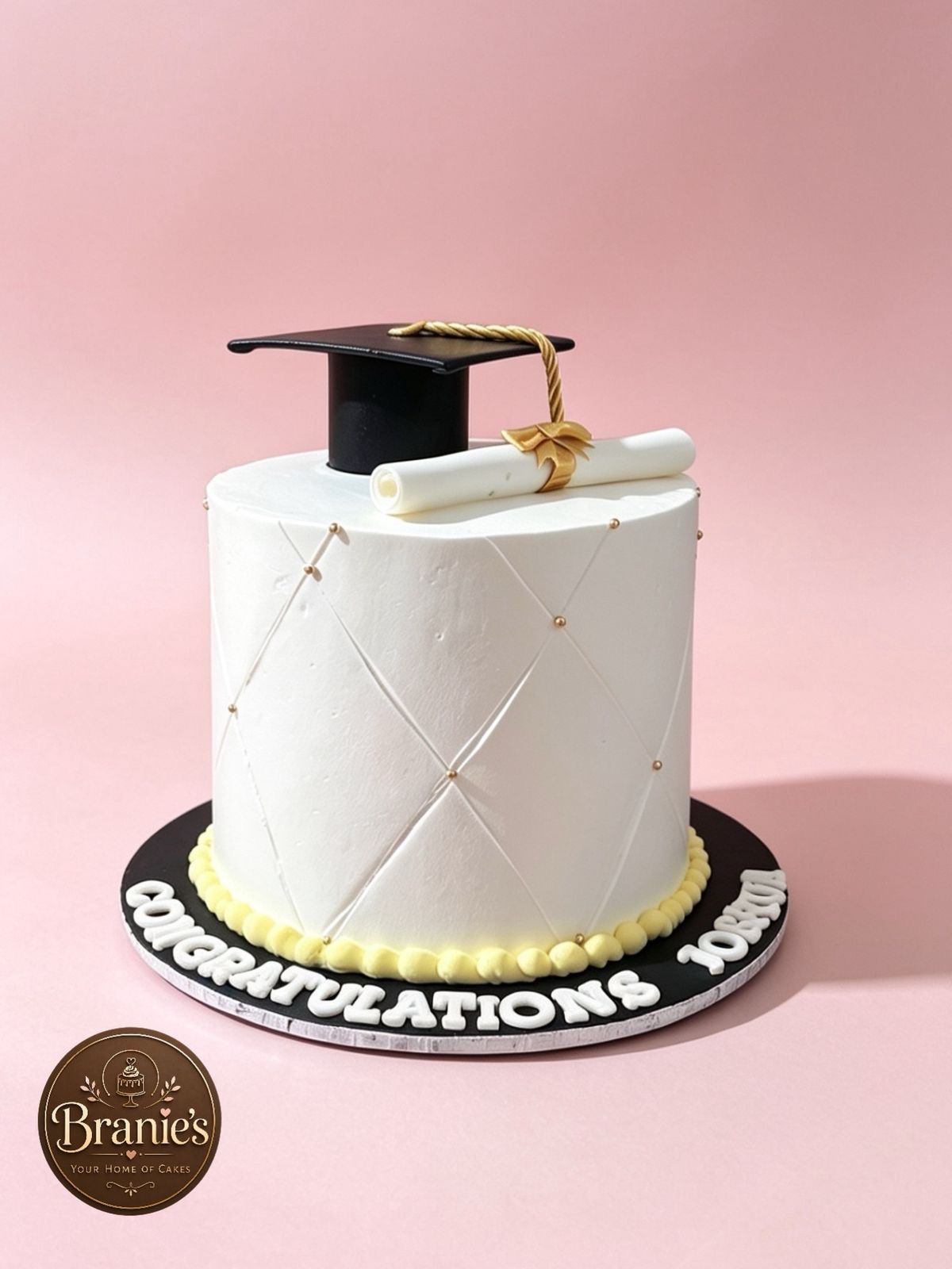 White quilted fondant graduation cake with mortarboard topper