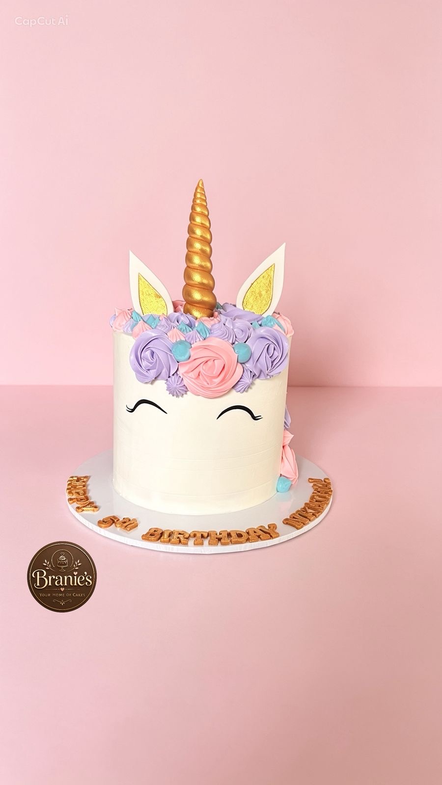 Whimsical unicorn cake by Branie's Bakery
