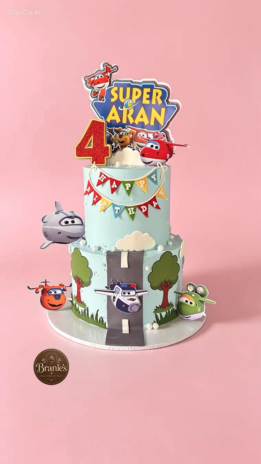 Two tier Super Wings themed cake